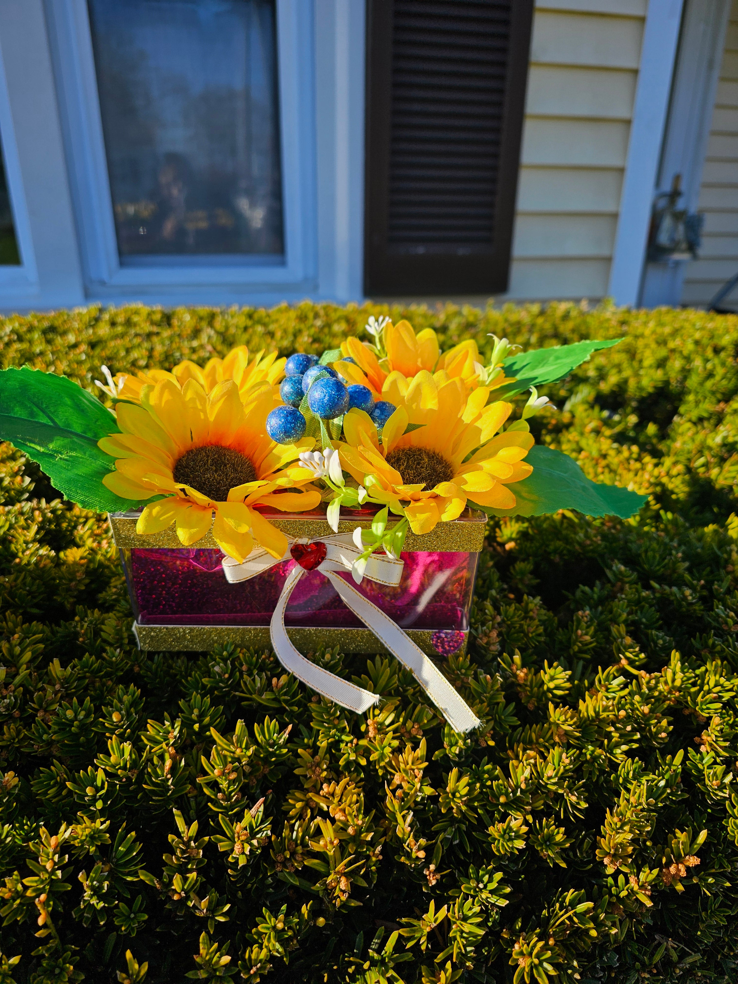 Cute artificial sunflower arrangement
