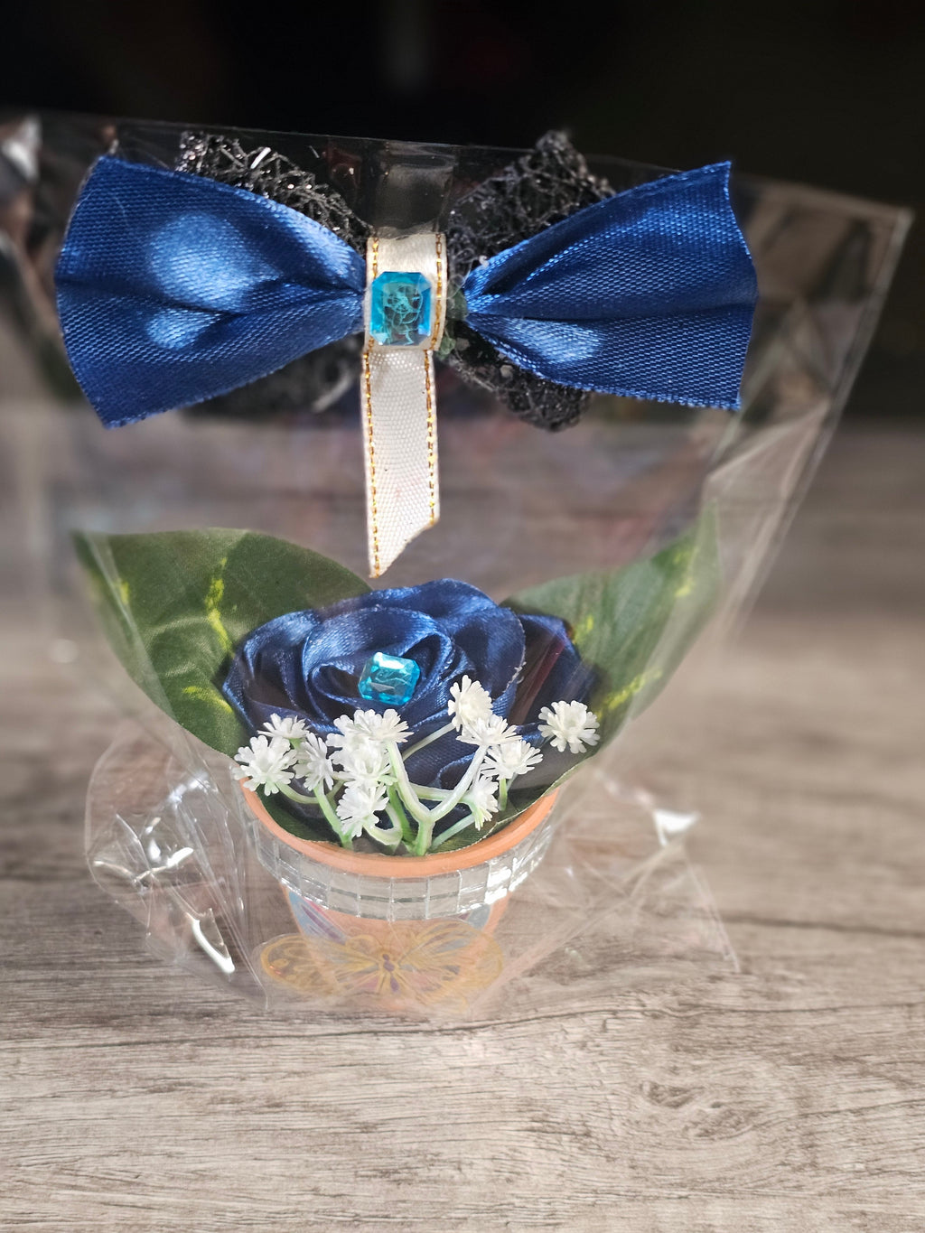 Blue Rose Floral Arrangement with Bow