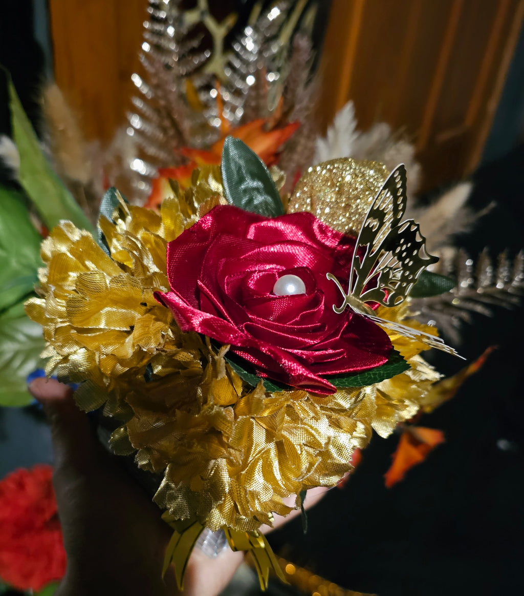 Golden Floral Arrangement with Butterfly