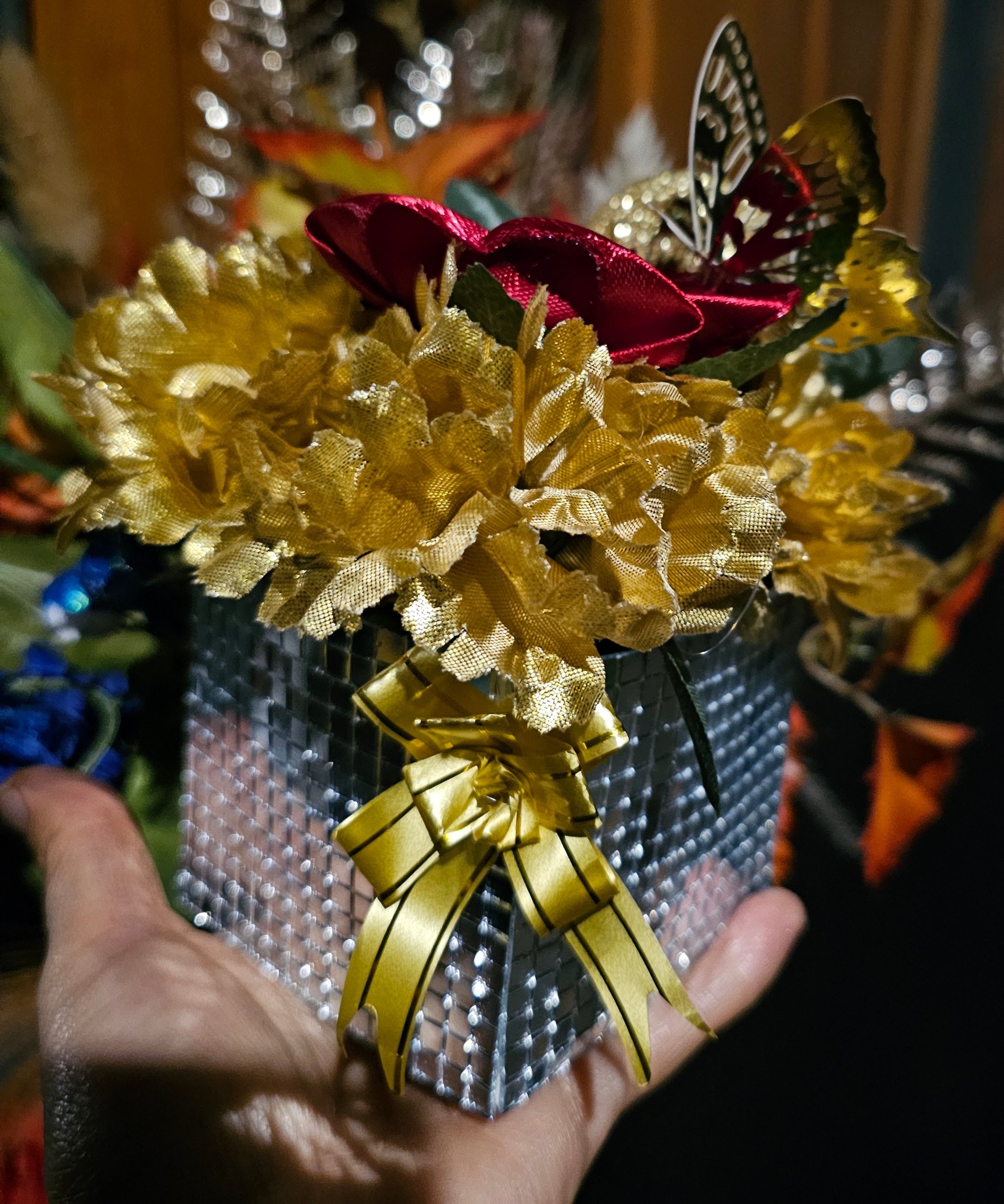 Golden Floral Arrangement with Butterfly